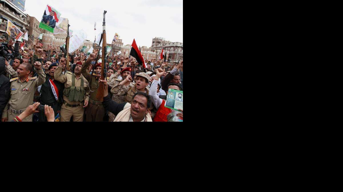 
WAR IN YEMEN: Shiite rebels, known as Houthis, gather to protest against Saudi-led airstrikes, during a rally in Sanaa, Yemen. 
