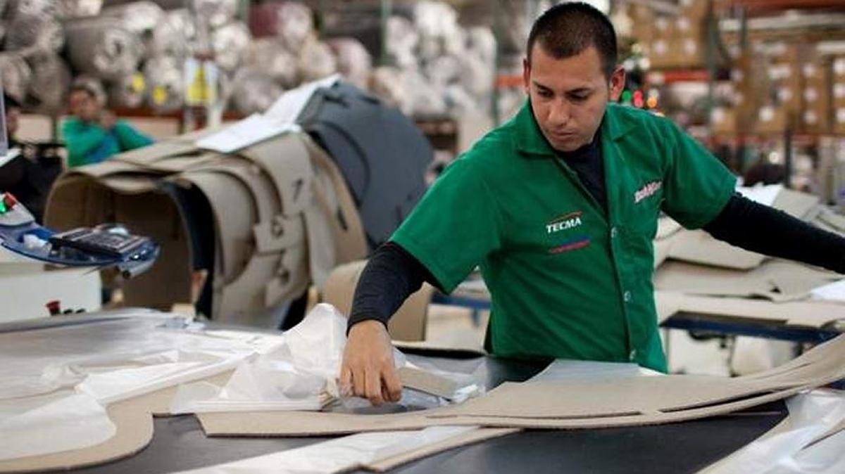 NAFTA, now 23 years old, created jobs for Mexicans. In 2014, Marcos Godoy manufactured car mats at a Mexico City factory.