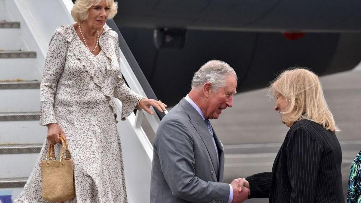 Prince Charles and Camilla, Duchess of Cornwall are greeted on the island by Cuba's Deputy Minister of Foreign Affairs Ana Teresita Gonzalez. |