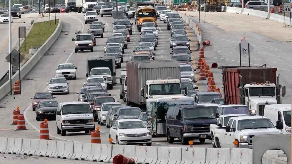 A woman is in custody after causing two accidents on the Dolphin Expressway, fleeing and attacking Miami Beach Police officer, multiple media outlets report.