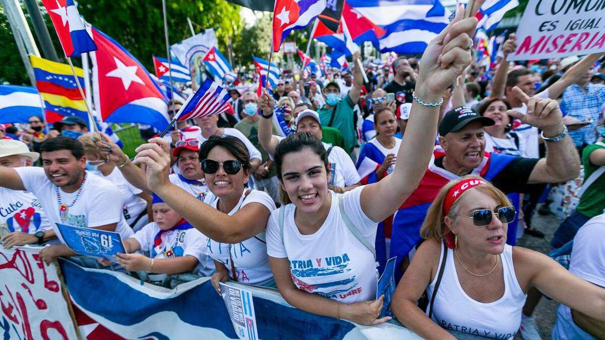 Activists participate in a rally at Bayfront Park in downtown Miami on Saturday.The rally was held in solidarity with the anti-government protests happening in Cuba, Venezuela and Nicaragua.