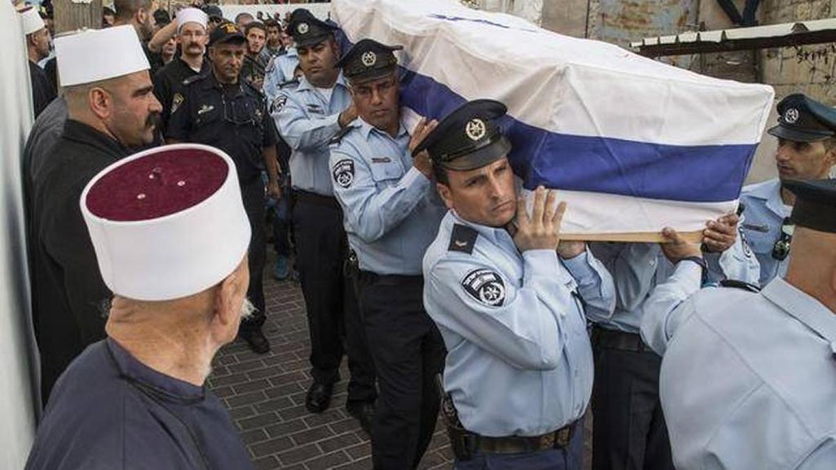 Back in 2014, Israeli police officers carry the coffin of their comrade, Zidan Saief, who died in an attack on a synagogue by Palestinians.