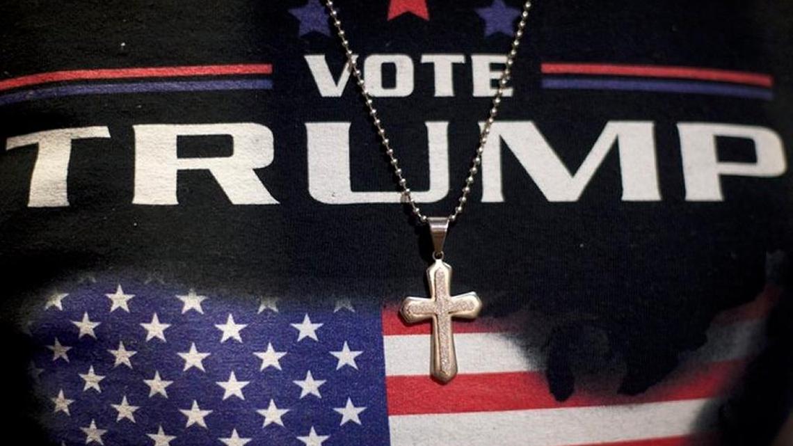 Minister E.J. Christian wears a cross necklace before Donald Trump, then the the Republican presidential nominee, held an event in Gettysburg in October 2016.