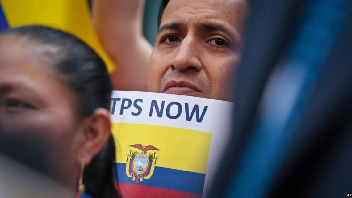 A demonstrator calls on federal authorities to designate Ecuador for Temporary Protected Status (TPS) for its nationals in the aftermath of a 2016 earthquake.