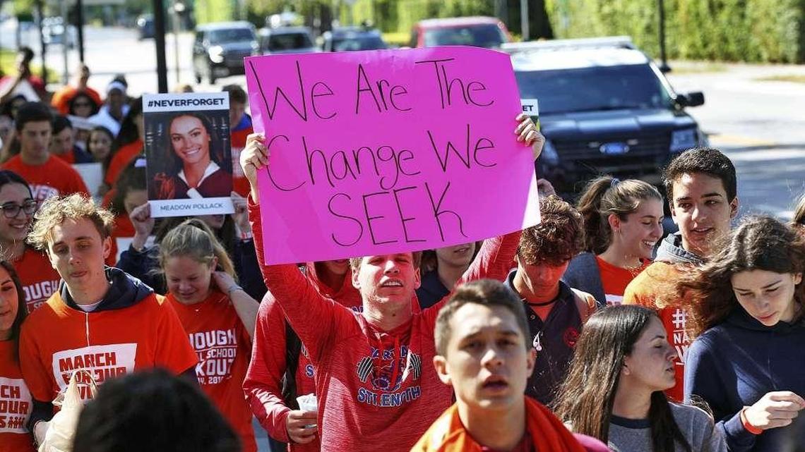 Hundreds of students from Miami Country Day, in Miami Shores, march during the national school walkout protesting gun violence and honoring the 17 people killed at Marjory Stone Douglas High School.