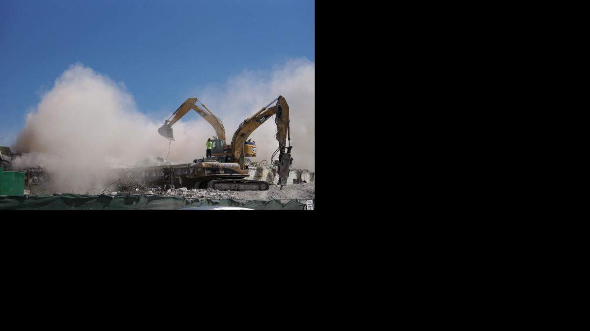 
ADIOS & FAREWELL: The last bit of structure of the old Miami Herald building in downtown Miami came down this week.
