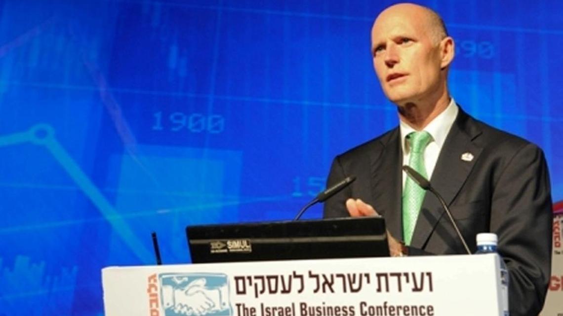 Florida Gov. Rick Scott addresses business leaders in Tel Aviv.