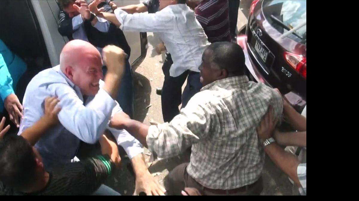 
PANAMA SUMMIT: Anti-Castro demonstrators were attacked by a pro-Castro mob in Panama City on the eve of the VII Summit of the Americas. 
