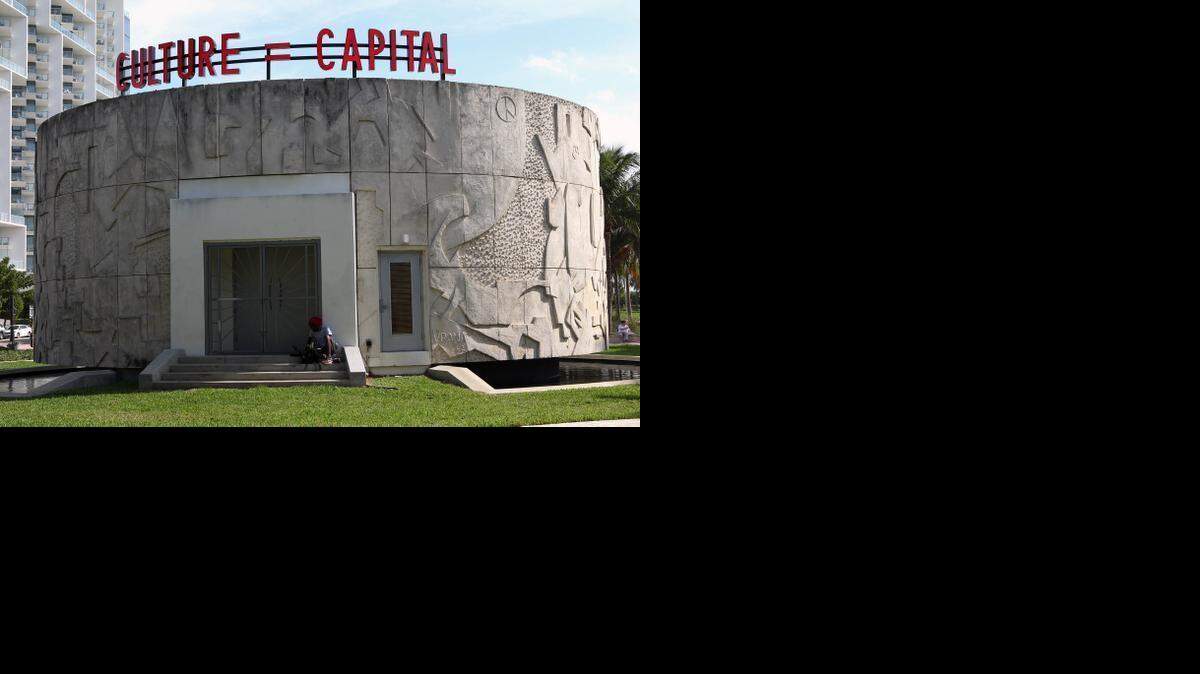 
ARTS SCENE: The message “Culture = Capital” on top of the rotunda in Collins Park in front of the Bass Museum was installed as part of Art Basel’s yearly public program.
