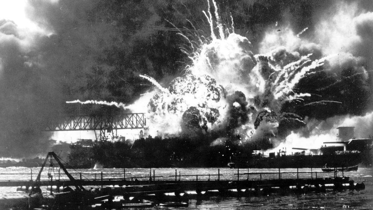 FILE - In this Dec. 7, 1941 file photo, the destroyer USS Shaw explodes after being hit by bombs during the Japanese surprise attack on Pearl Harbor, Hawaii. Wednesday marks the 70th anniversary of the attack that brought the United States into World War II. (AP File Photo)