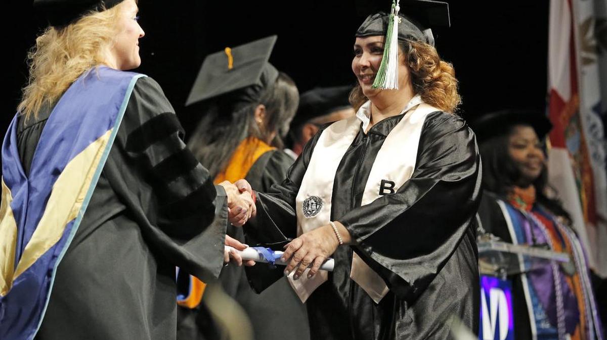 MDC students receive diplomas at graduation ceremonies in April. Since its inception in 1960, 2 million students have attended MDC.