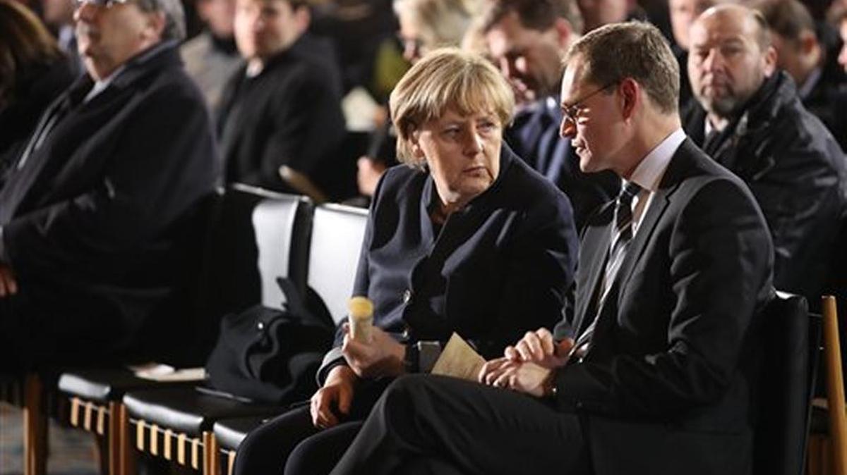 German chancellor Angela Merkel attends a memorial service for victims of the Christmas market truck attack.