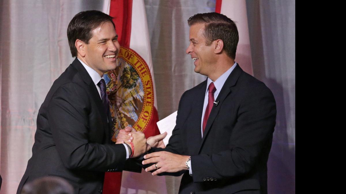 
ON THE CAMPAIGN TRAIL: Lt. Gov. Carlos Lopez-Cantera, right, introduced Sen. Marco Rubio at the Miami-Dade County Republican Party's annual Lincoln Day Dinner in Miami on Saturday.
