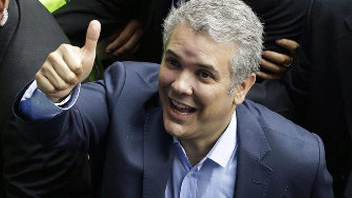 Candidate Ivan Duque, who ultimately won the June 17 presidential race in Colombia, gives a thumbs up after voting in Bogota.