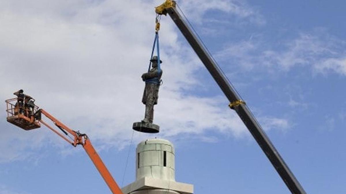 A statue of Confederate Gen. Robert E. Lee is removed from Lee Circle in New Orleans.