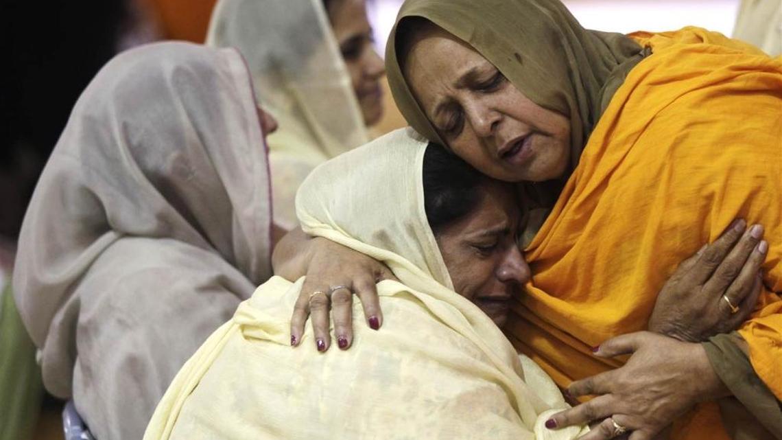 In 2014, women mourned the lives lost two years earlier in the massacre at a Sikh temple in in Oak Creek, Wisconsin.