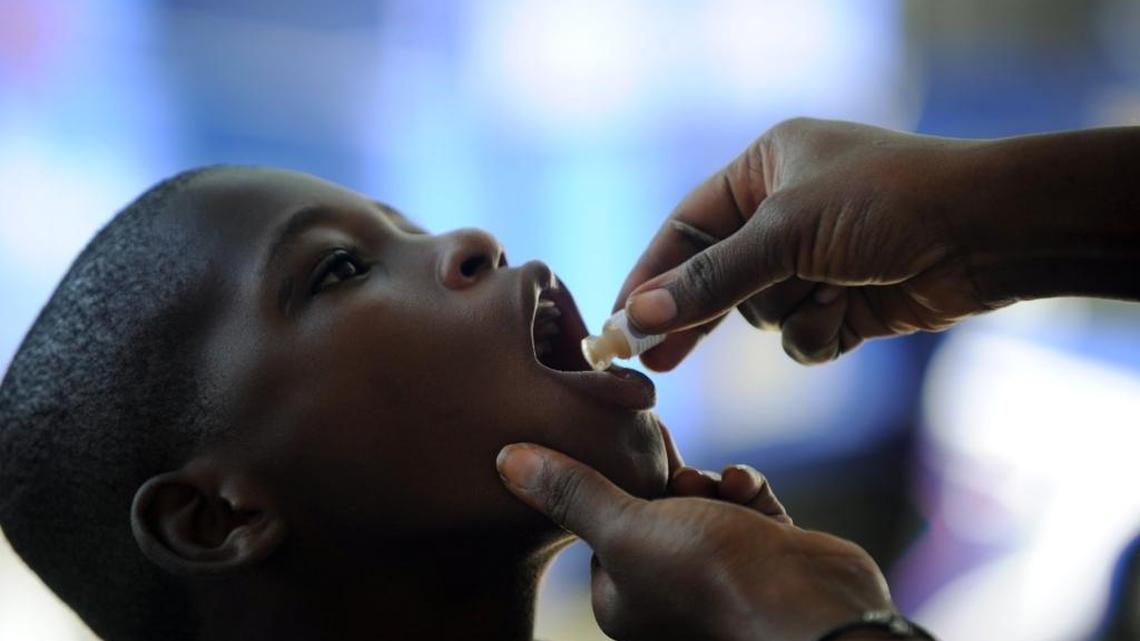 A boy receives the second dose of the vaccine against cholera in Saut d’Eau, in the Central Plateau of Haiti, part of the United Nations’ second phase of a vaccination campaign.