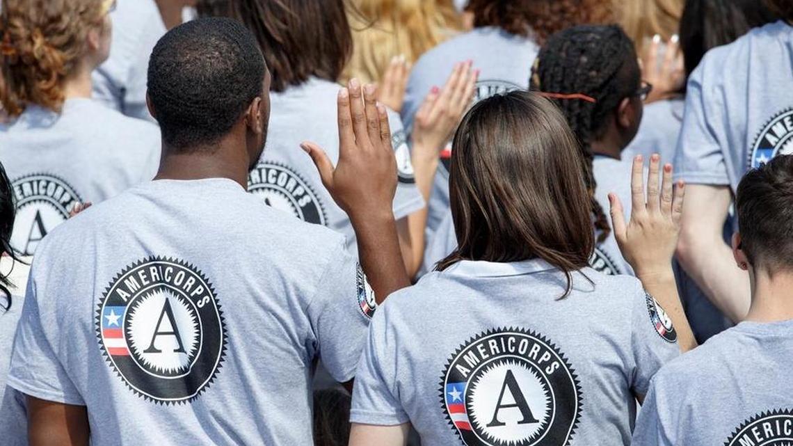 AmeriCorps volunteers attend a ceremony at the White House in 2014.