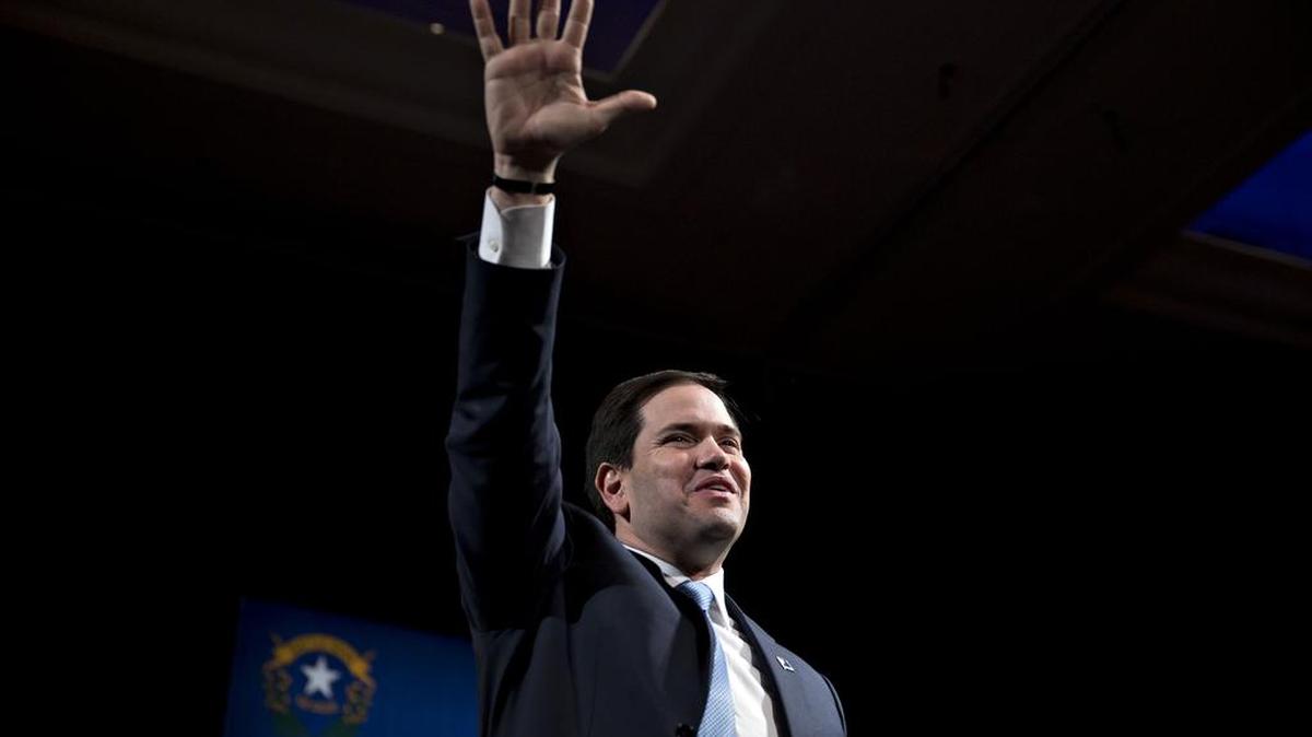 Sen. Marco Rubio waves to the crowd after speaking during a campaign rally in Reno, Nevada, on Monday.