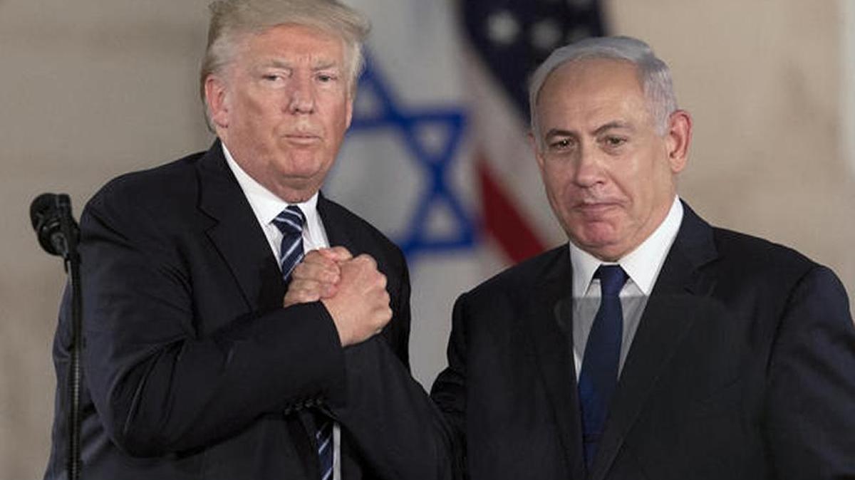 President Trump and Israeli Prime Minister Benjamin Netanyahu clasp hands at a museum in Jerusalem in May.