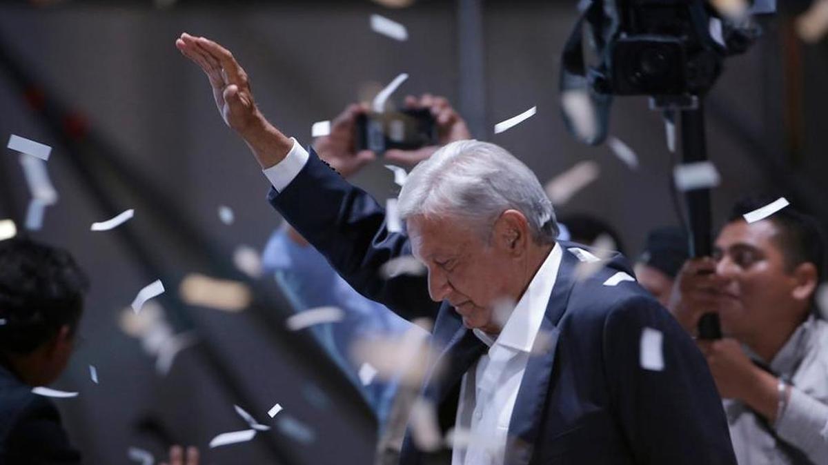 New Mexican President Andres Manuel Lopez Obrador waves to supporters as he arrives to Mexico City's main square on Sunday.