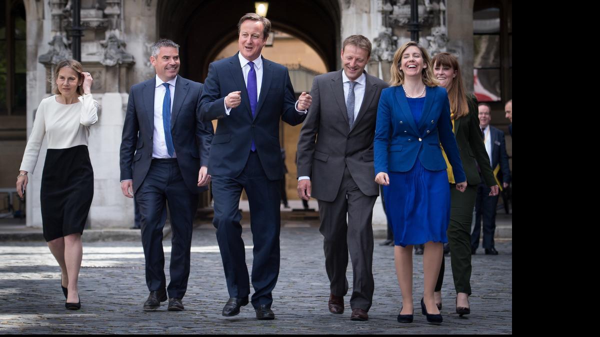
WINNER: An ebullient David Cameron emerges from Parliament on Monday with new Conservative Party MPs after his party won a surprise electoral victory last week that proved pollsters wrong.
