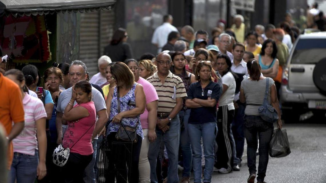 Shoppers in Venezuela must wait in line for hours outside stores to find basic consumer goods like sugar and detergent.