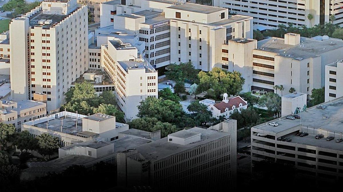 The aerial view shows UM Health System facilities encircling the Jackson Memorial Health System at its location west of downtown Miami.