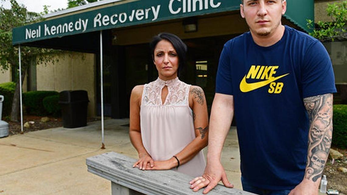 Recovering Niki Campana, left, and Paul Wright stand together outside the Neil Kennedy Recovery Clinic in Youngstown, Ohio. Republican efforts to roll back “Obamacare” are colliding with the opioid epidemic.