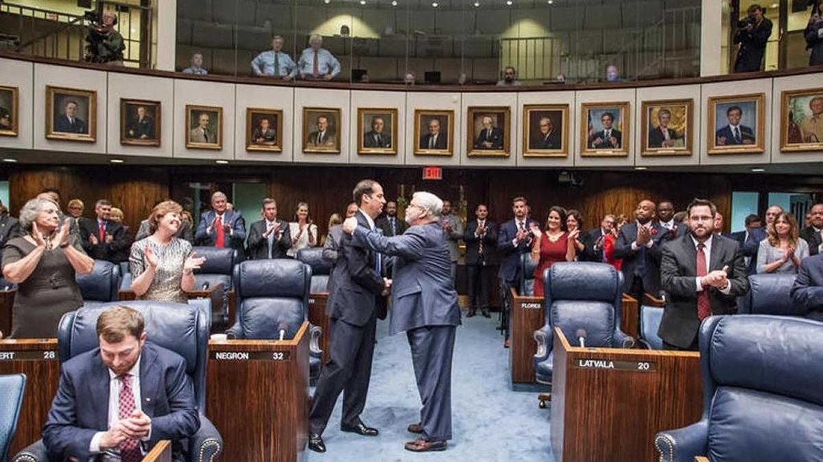State Sen. Jack Latvala, right, congratulates Sen. Joe Negron, who was elected Senate president.