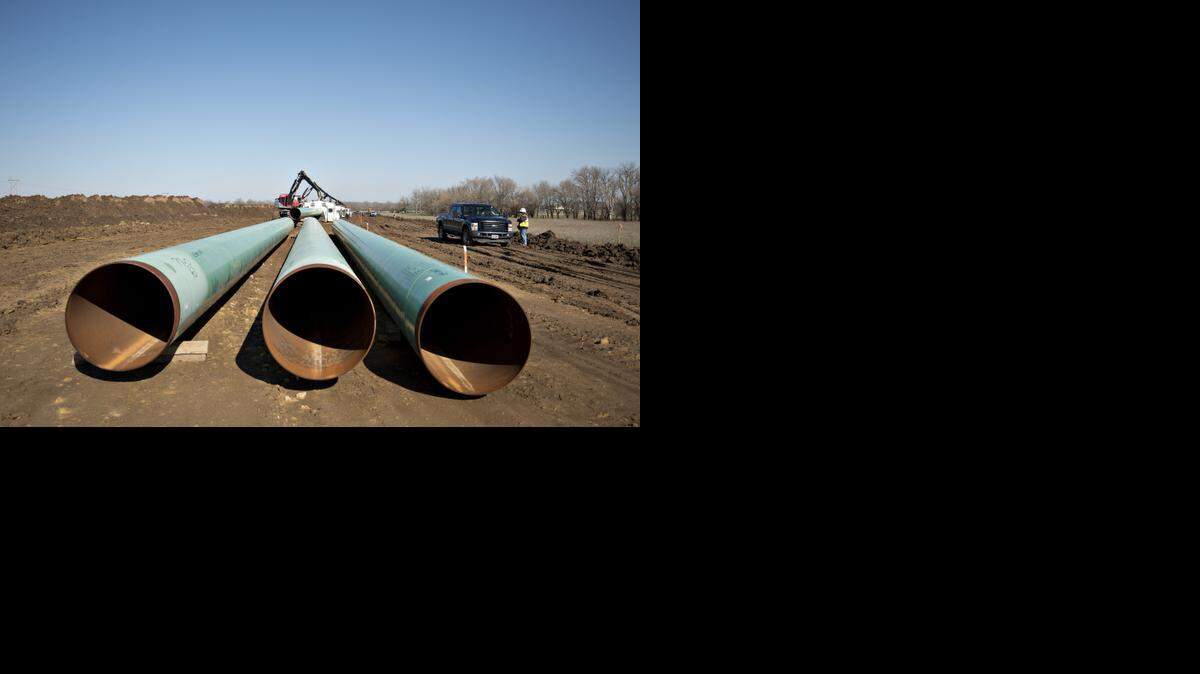 
READY TO GO:  Three sections of pipe that would connect the proposed Keystone pipeline to the Gulf Coast sit on the ground in Oklahoma during construction.
