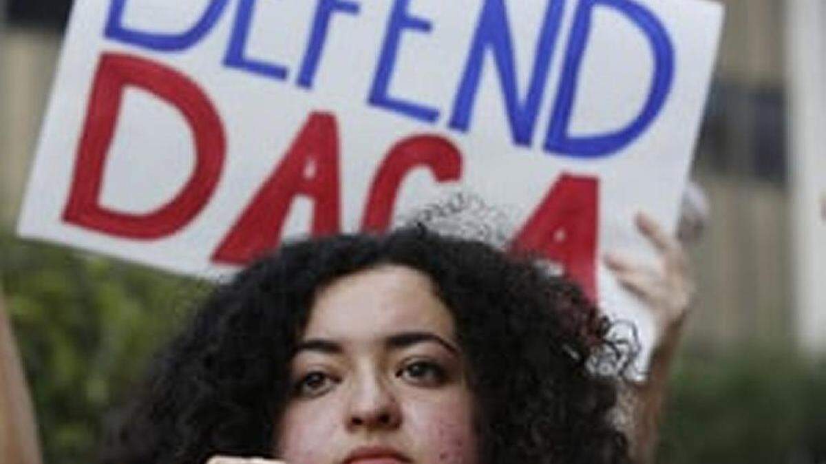 Loyola Marymount University student and DREAMer Maria Carolina Gomez joins a rally in support of DACA.