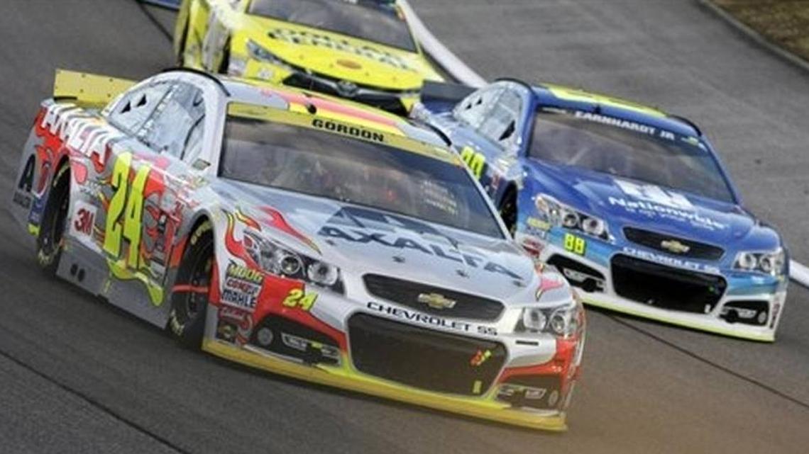 Dale Earnhardt Jr., driving No 88 on the right, participated in the NASCAR Sprint Cup Series auto race at at Homestead-Miami Speedway in 2015.