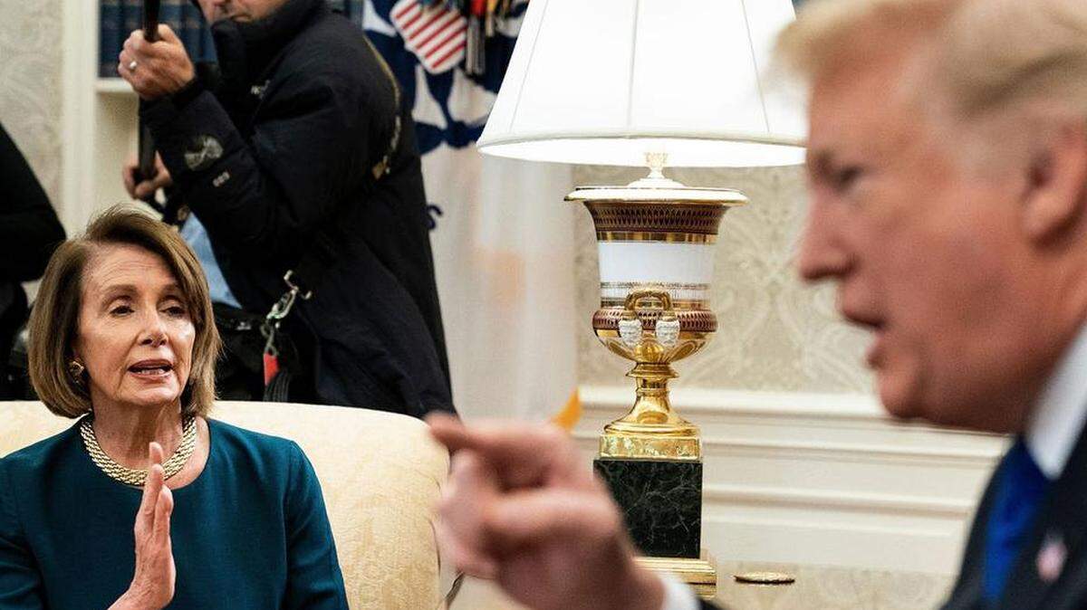 Newly elected House Majority Leader Nancy Pelosi jousts with President Trump over funding for a border wall in an Oval Office meeting on Tuesday.