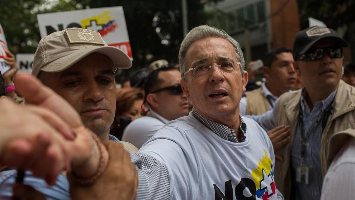 Former president Álvaro Uribe greets supporters at a Medellín demonstration against the peace process.