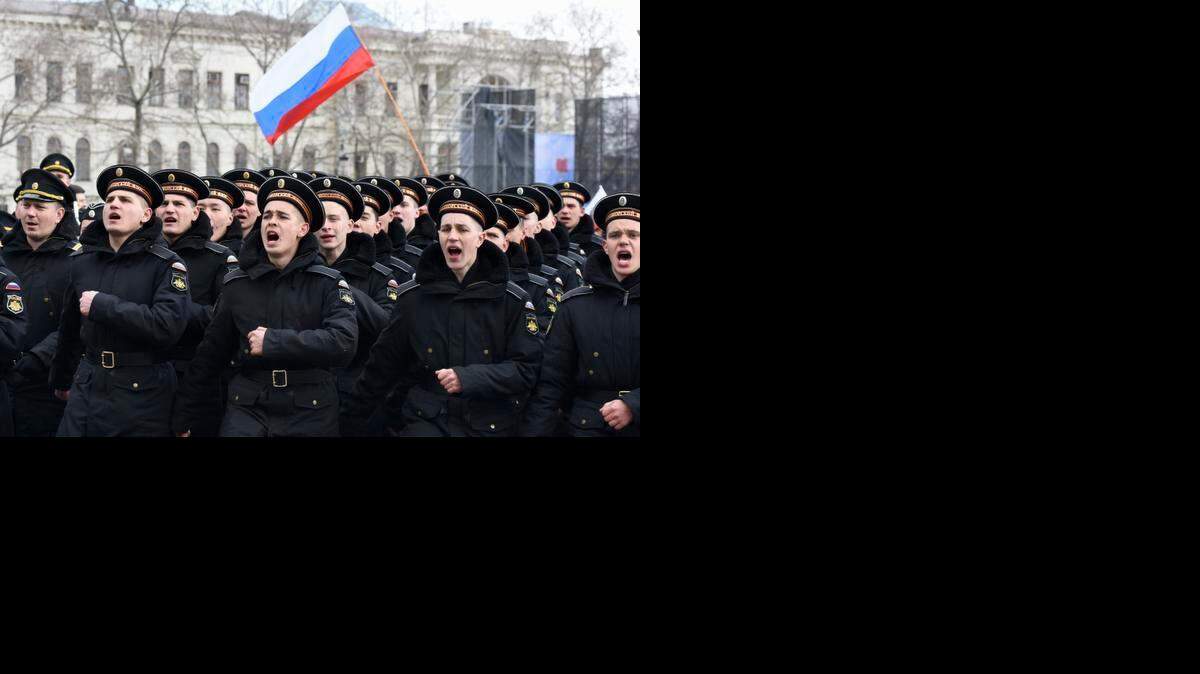 
CELEBRATION: Russian sailors march in a military parade in Sevastopol, Crimea last week to mark the one-year anniversary of the annexation of Ukraine’s Crimea peninsula. 
