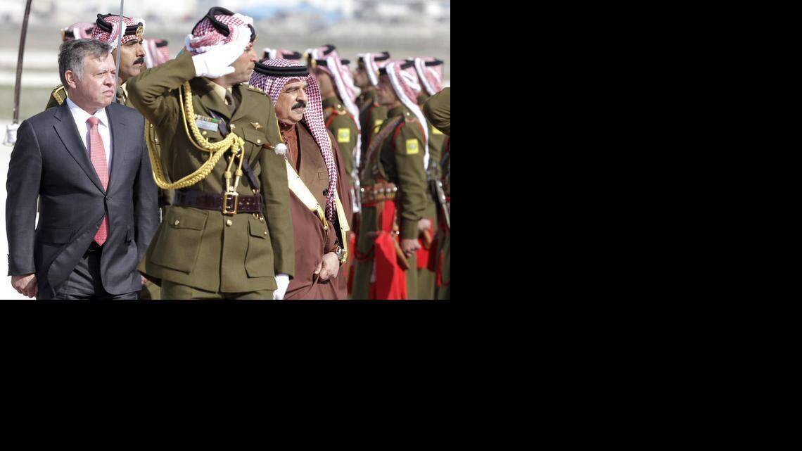 
FIGHTING TERROR: Jordan's King Abdullah II, left, reviews an honor guard with King Hamad bin Issa al-Khalifa of Bahrain. Both countries are part of the U.S.-led coalition against the Islamic State.
