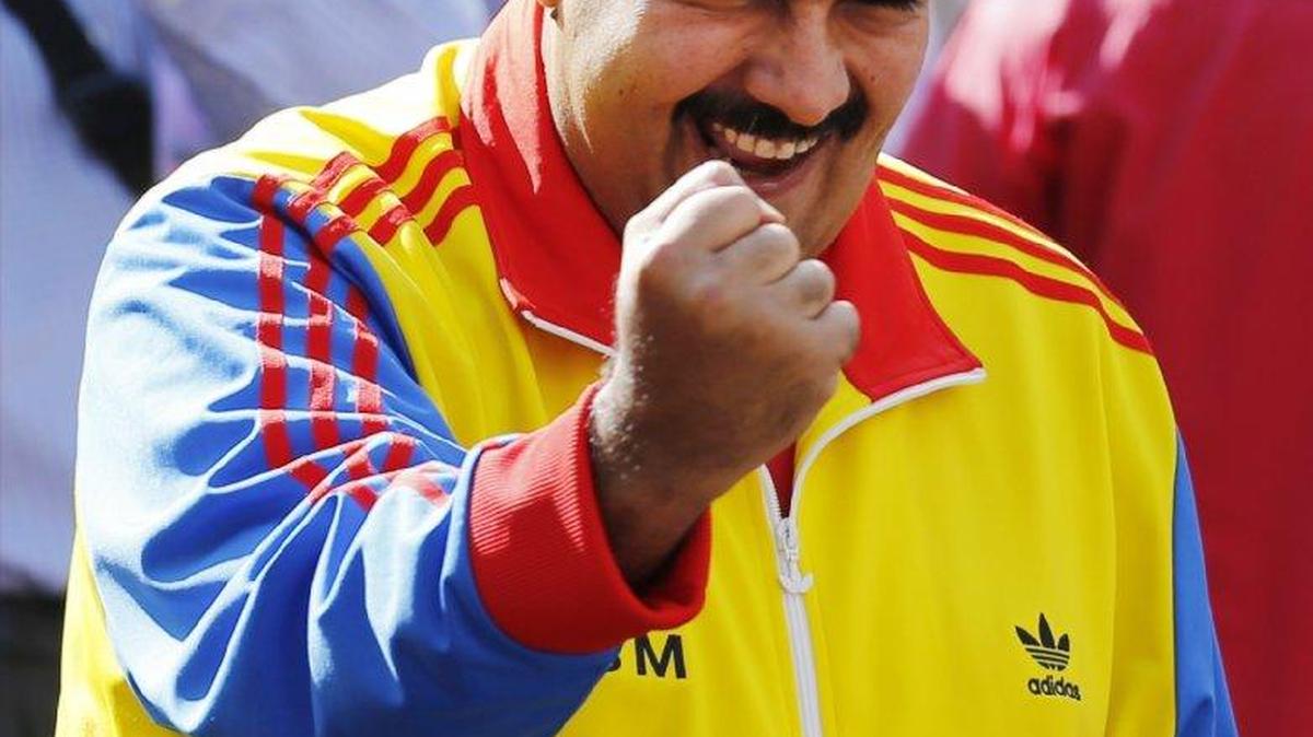 
In Caracas, Venezuela’s President Nicolas Maduro pumps his fist during an August rally in support of closing the Colombian border.
