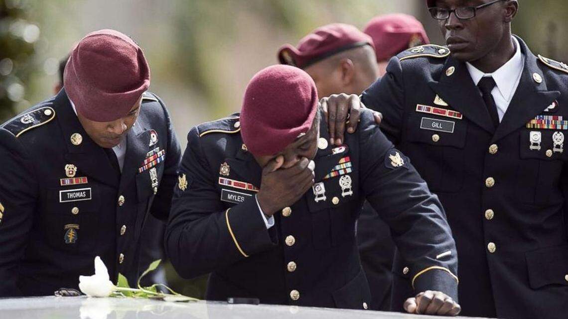 Members of the Special Forces cry at the tomb of Army Sgt. La David Johnson at his burial service in October at the Memorial Gardens East cemetery in Hollywood.