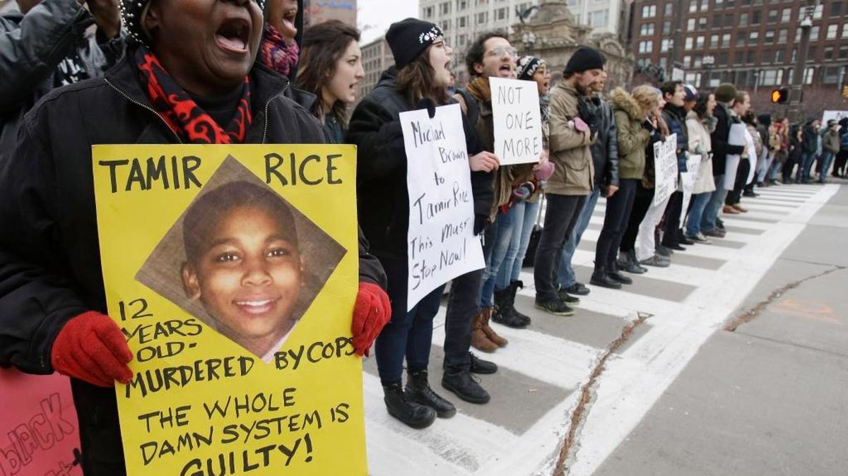 
FILE- In this Nov. 25, 2014, file photo, demonstrators block Public Square in Cleveland, during a protest over the police shooting of 12-year-old Tamir Rice. 
