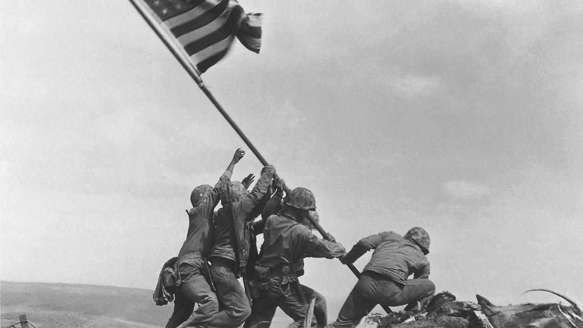 The iconic photograph of U.S. Marines raising a 48-star U.S. flag on Mt. Suribachi, Iwo Jima, was taken Feb 23, 1945.