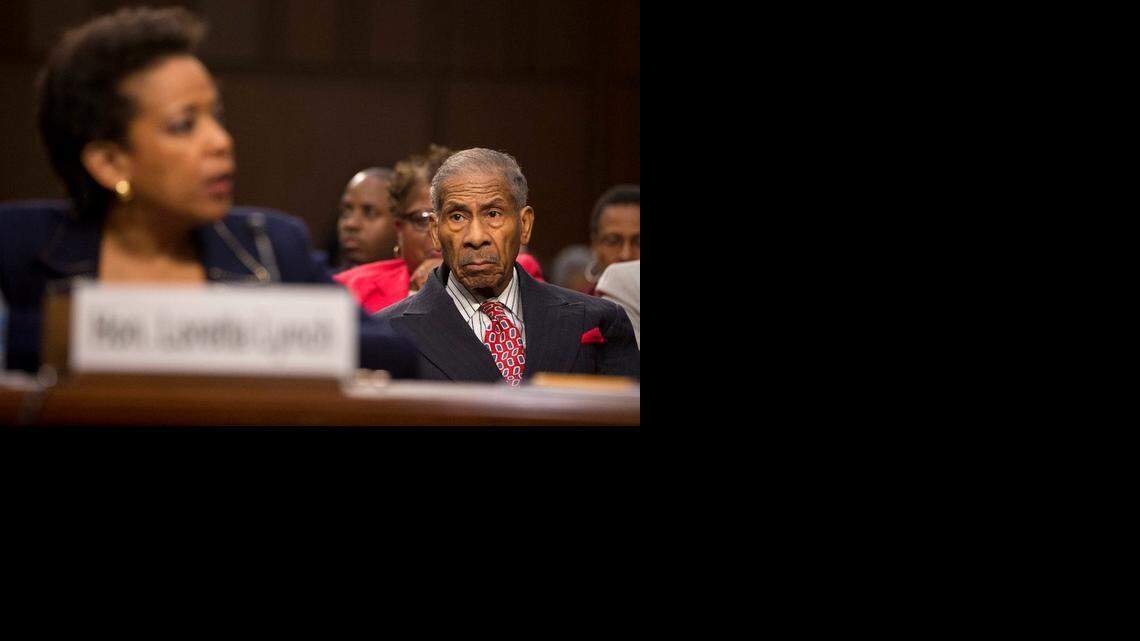 
ON CAPITOL HILL: Rev. Lorenzo Lynch, right, watches his daughter, Loretta Lynch, as she answers questions during the Senate Judiciary Committee’s confirmation hearing. 
