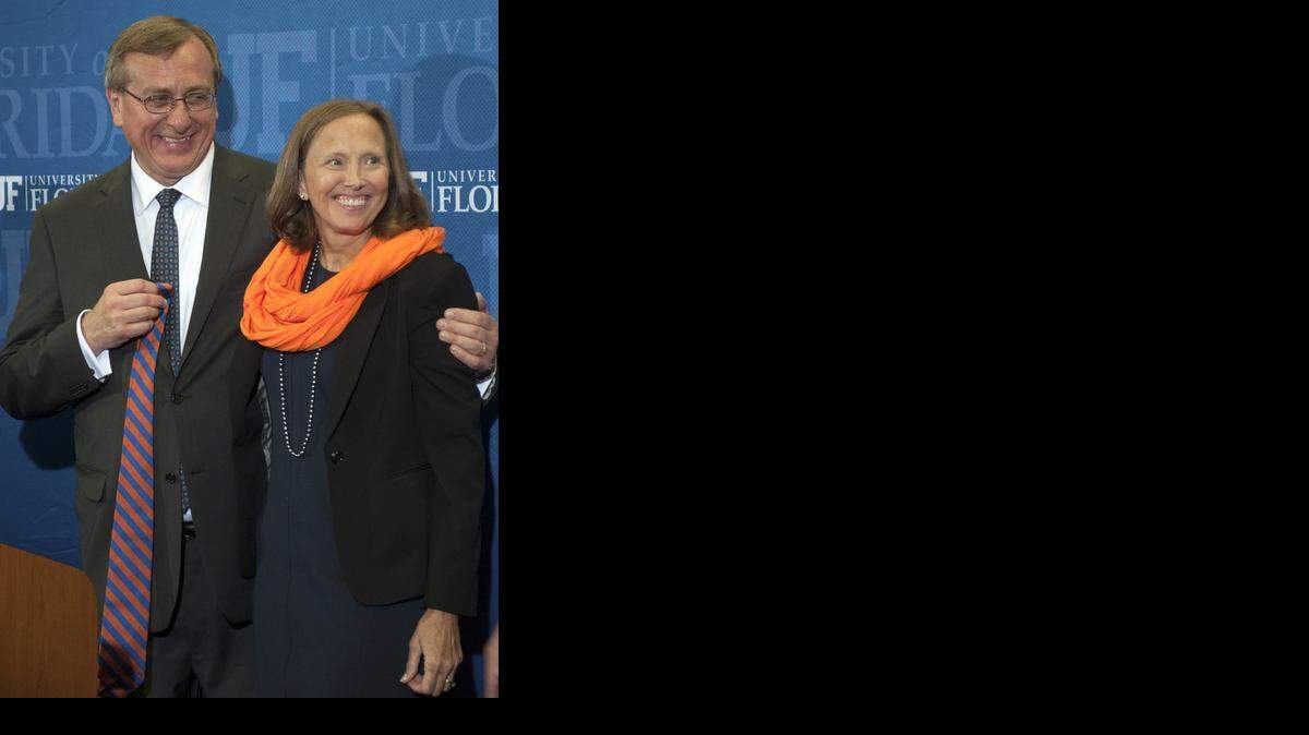 
TOP GATOR: UF President-elect W. Kent Fuchs and his wife, Linda, at a news conference announcing his appointment.
