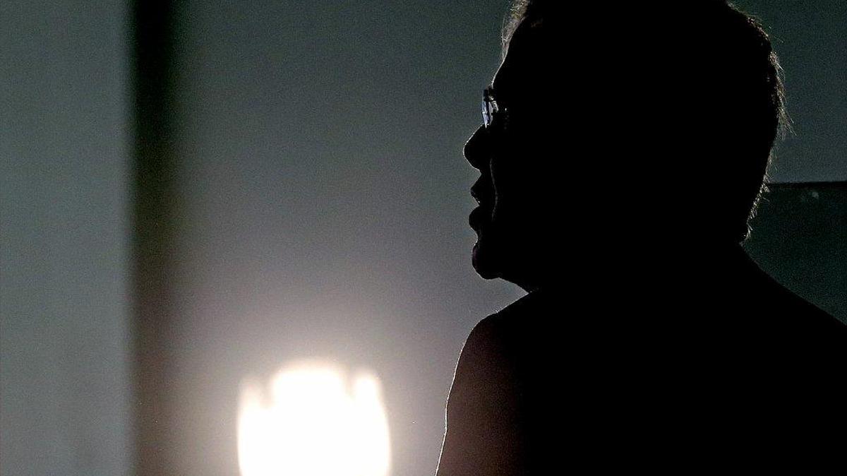 Former Florida Gov. Jeb Bush is silhouetted against a light during a rally Monday in Tampa.