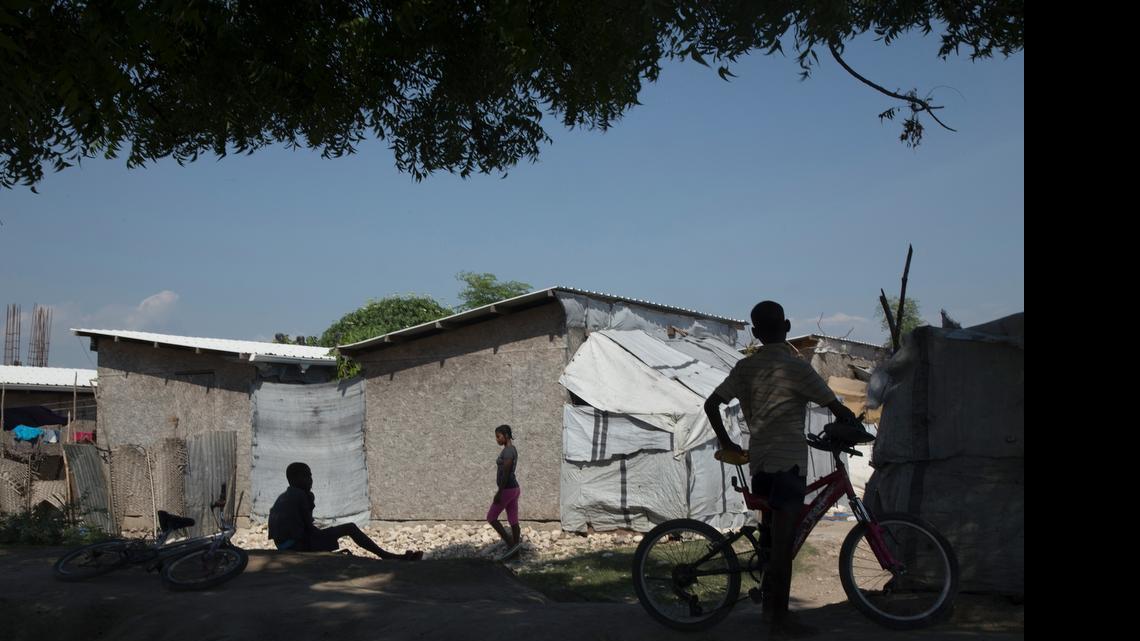 
Homes in the the Parc Tony Colin community in Bon Repos. Most of the residents of the community were moved from the Tabarre neighborhood where they lived in tents after the 2010 earthquake. Many residents are having problems with rain that leaks in through the holes made by the nails on their roofs and their walls are starting to deteriorate from water damage.
