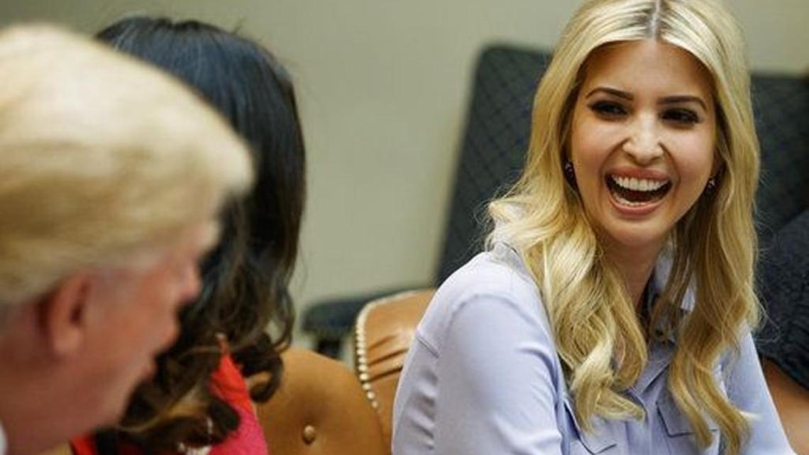 Ivanka Trump has a laugh with her father, President Donald Trump, during a meeting with women small business owners at the White House last month.