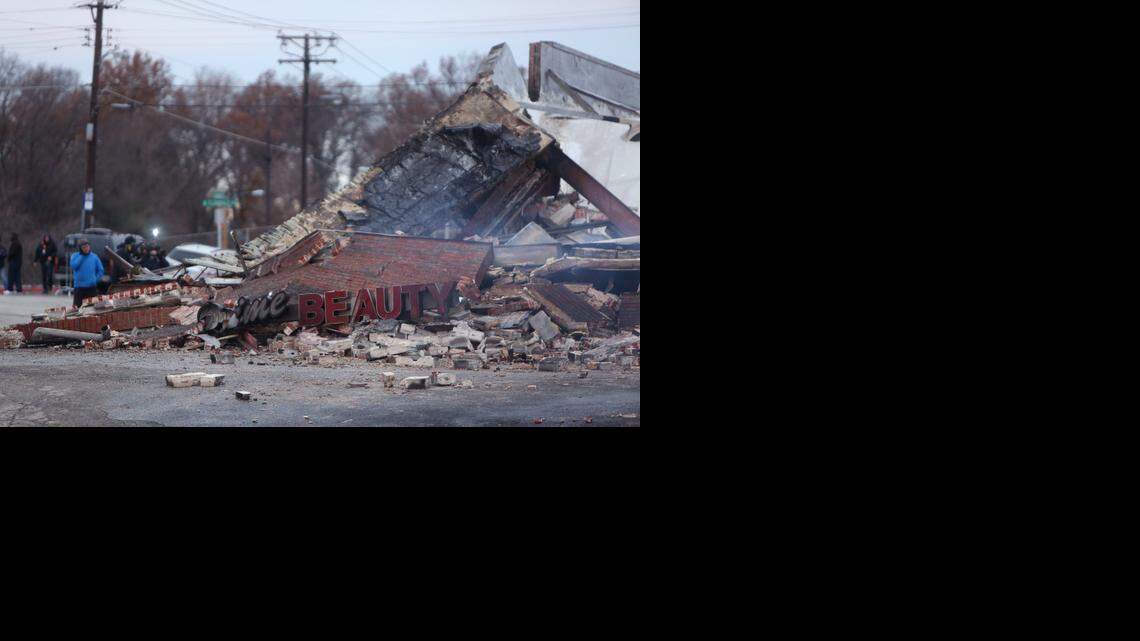 
AFTERMATH: All that was left of a beauty supply store in Ferguson, Missouri, on Tuesday were smoldering remains. 
