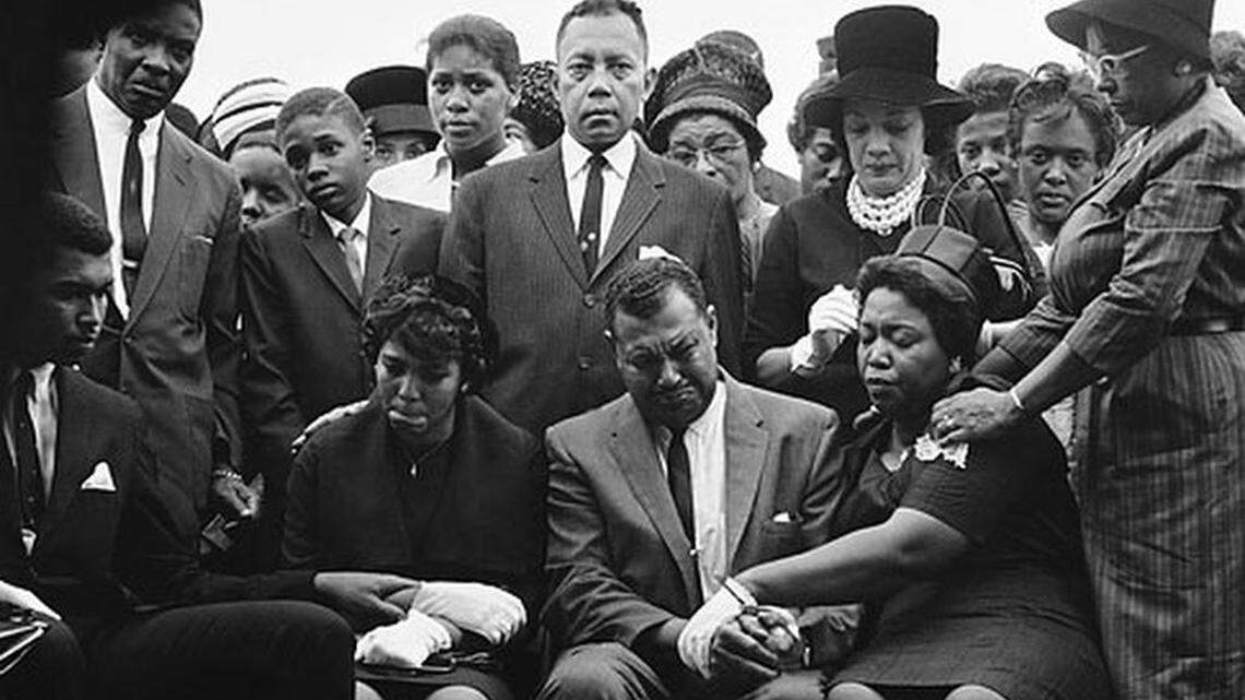 The family of Carol Robertson, a 14-year-old African American girl killed in a church bombing, attend graveside services for her on Sept. 17, 1963 in Birmingham, Alabama.