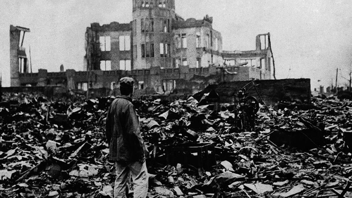 A man in Hiroshima looks over the ruins left after the United States dropped the atomic bomb in August 1945.