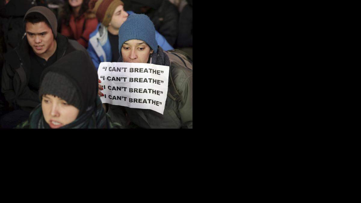 
NO LETUP: Protests have continued in New York and elsewhere in response to the grand jury’s decision in the Eric Garner case. This one was in Times Square.
